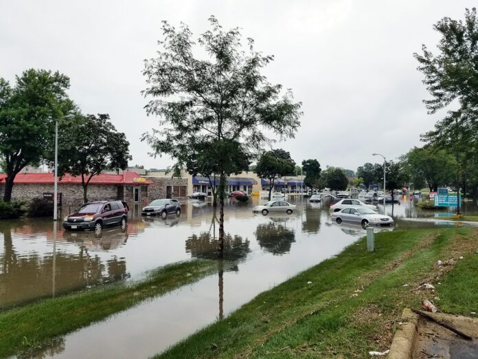 Photo by jim gade cars on flooded street