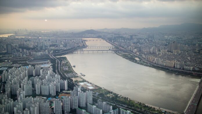 Photo by JEONGUK - bird's eye view photo of cityscape during daytime