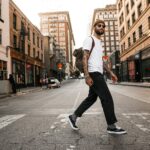 걷기 혁명! 일상 속 작은 습관이 건강 트렌드로 man in white long sleeve shirt and black pants standing on road during daytime