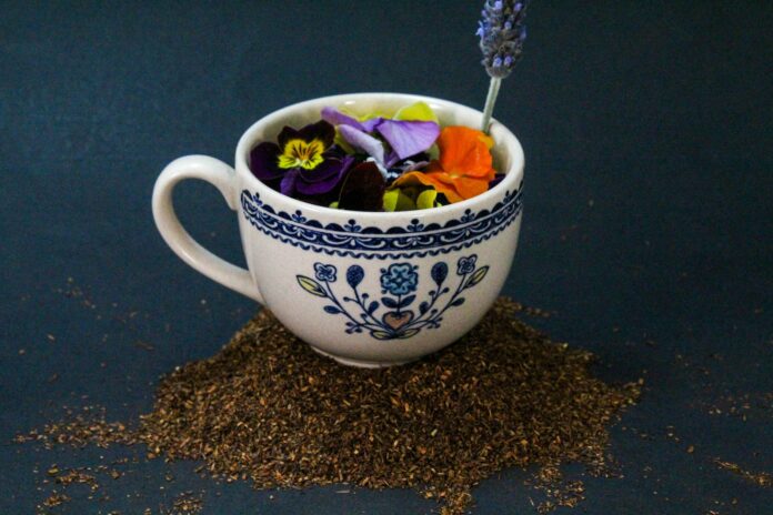 a cup with a flower design